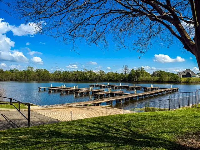 a room with gym equipment and windows