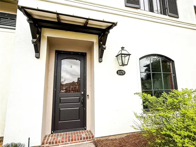 a front view of a house with shower