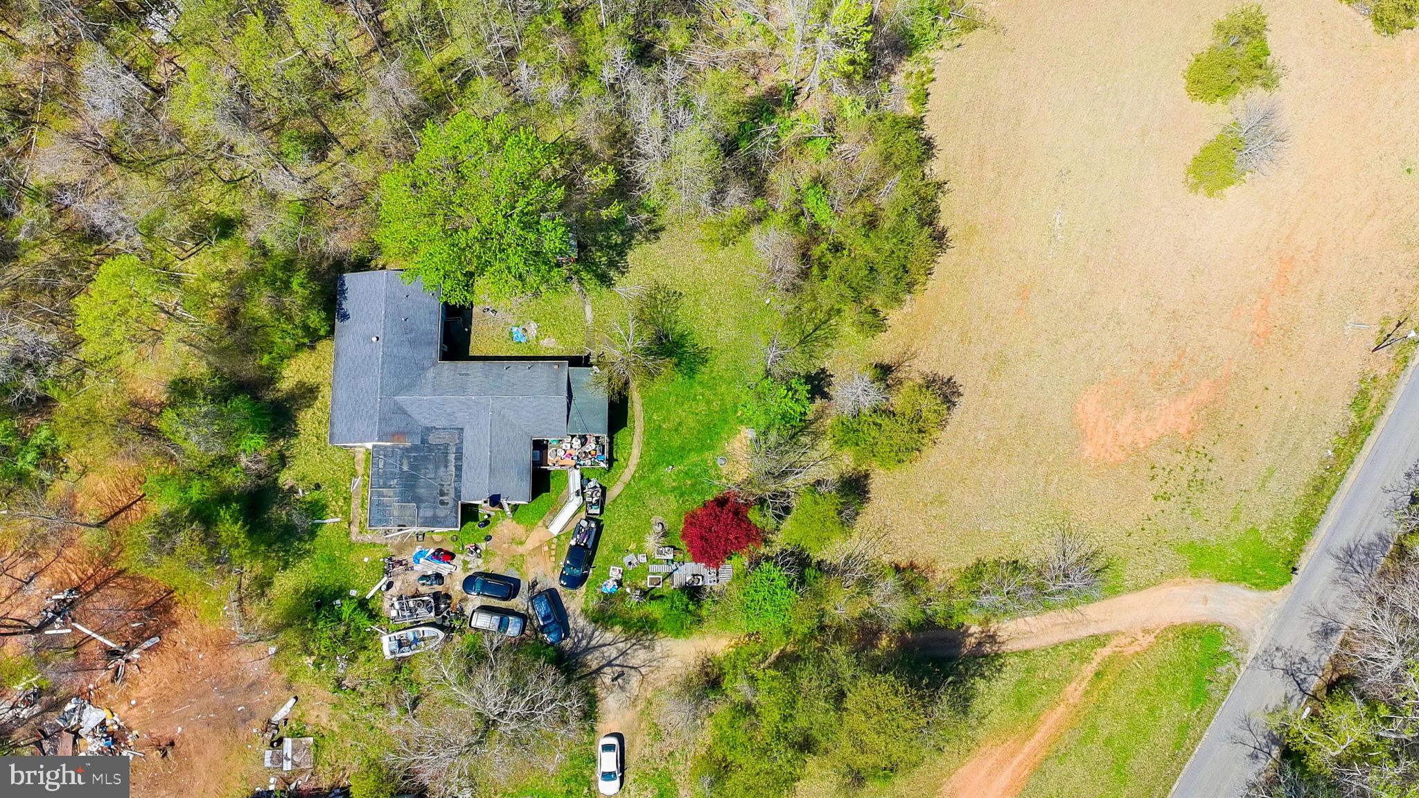 2263 Buckner Road Bumpass, VA 23024 - Photo 21 of 26 Sprawling property with lush greenery.