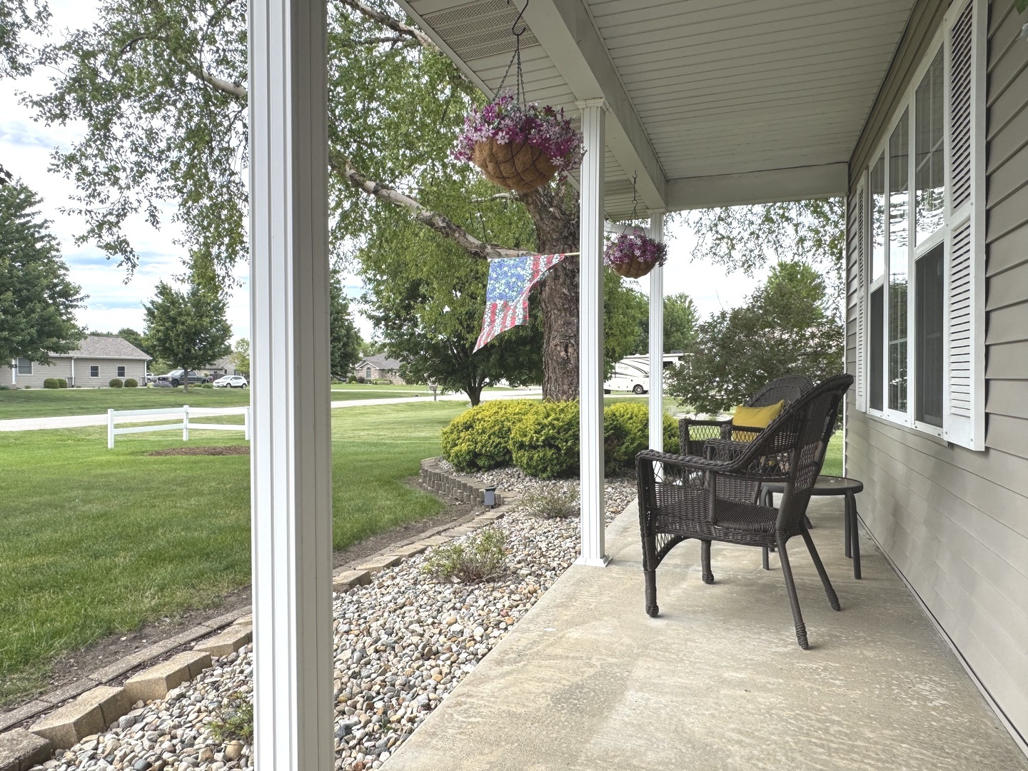 2041 Bluff Road South Kankakee, IL 60901 - Photo 4 of 39 a view of a porch with chairs and backyard