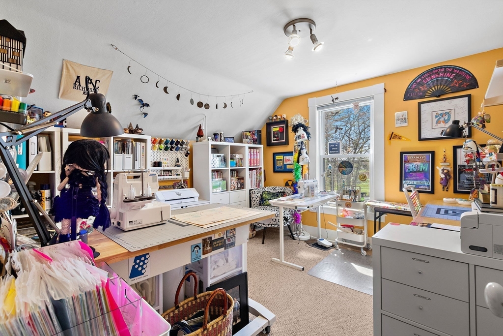 141 Westview Road Lowell, MA 01851 - Photo 14 of 39 a view of a workspace with furniture and toys