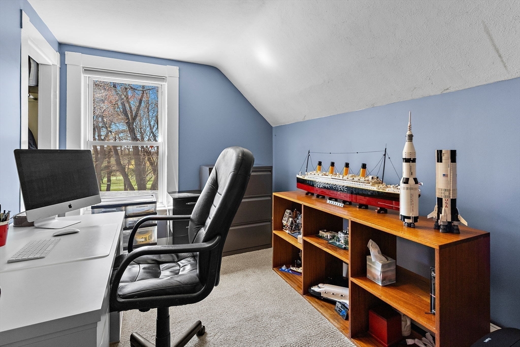 141 Westview Road Lowell, MA 01851 - Photo 15 of 39 a view of a workspace with furniture and a window