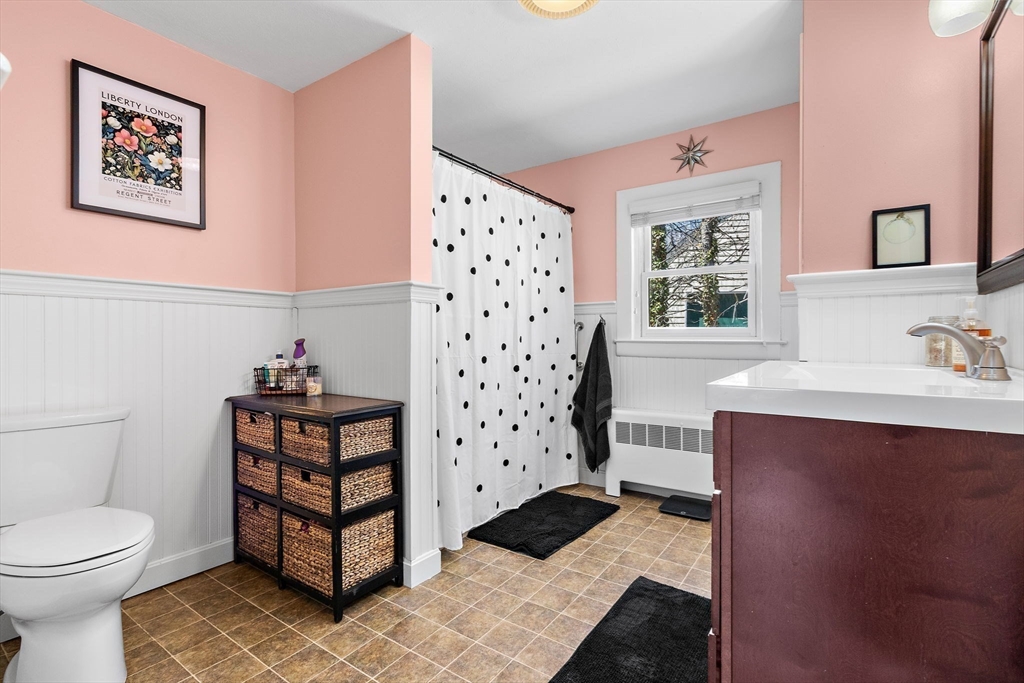 141 Westview Road Lowell, MA 01851 - Photo 16 of 39 a bathroom with a sink toilet and shower