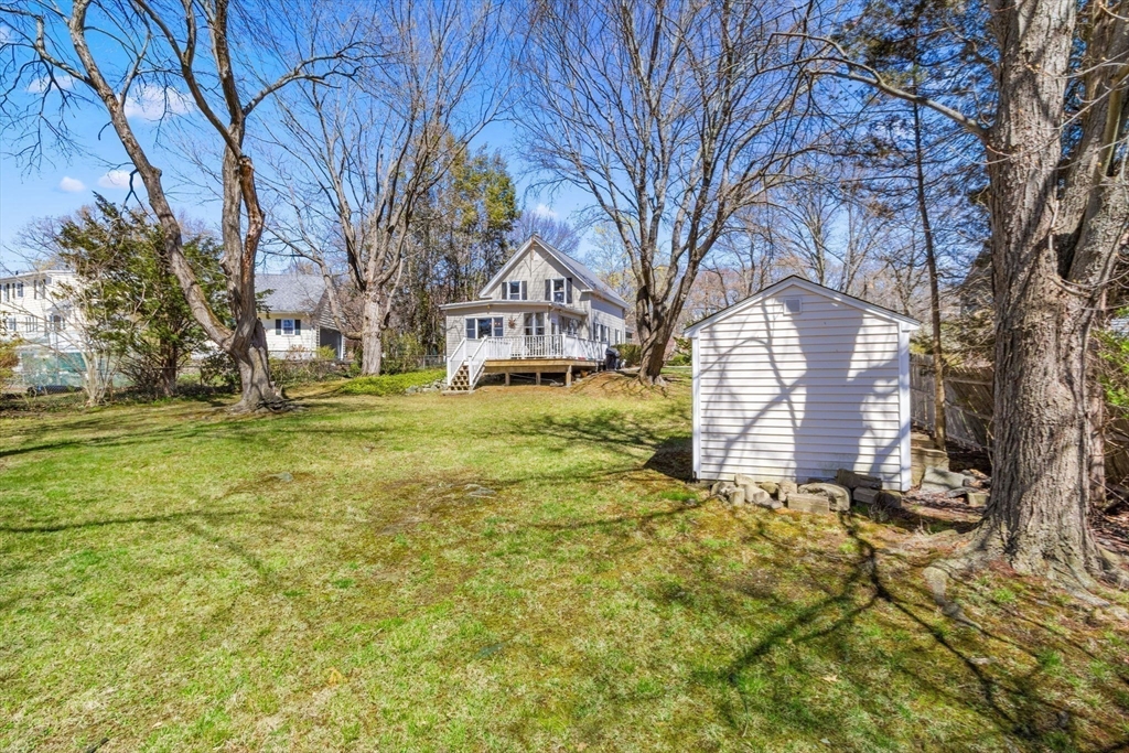 141 Westview Road Lowell, MA 01851 - Photo 24 of 39 a view of a yard with large trees