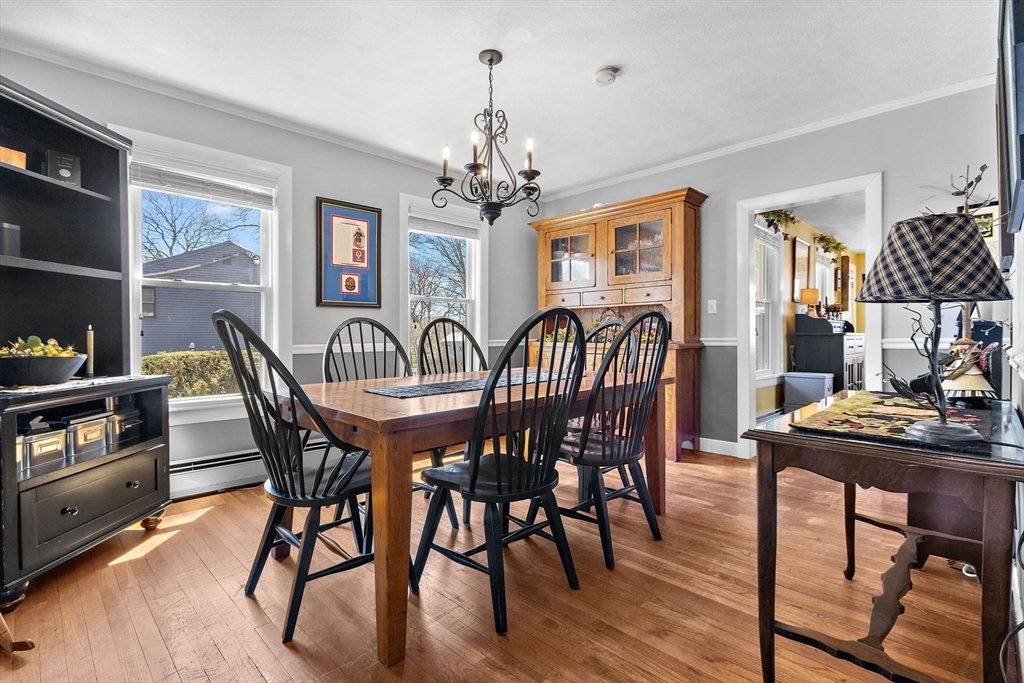 141 Westview Road Lowell, MA 01851 - Photo 10 of 39 a view of a dining room with furniture window and wooden floor