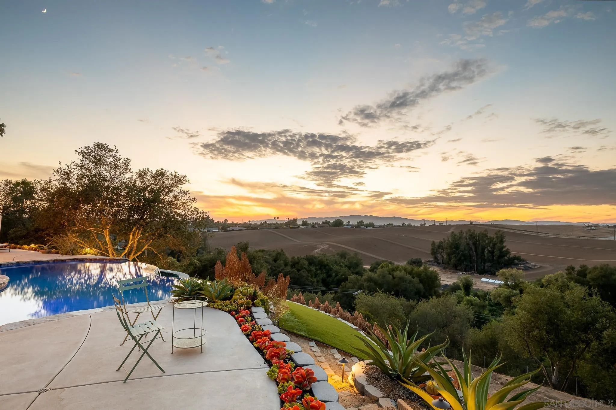 1834 Winterwarm Drive Fallbrook, CA 92028 - Photo 1 of 49 a view of a terrace with a garden