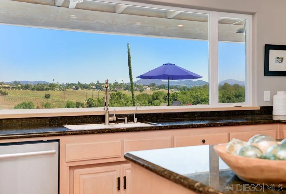 1834 Winterwarm Drive Fallbrook, CA 92028 - Photo 13 of 49 a view of a room with furniture and wooden floor