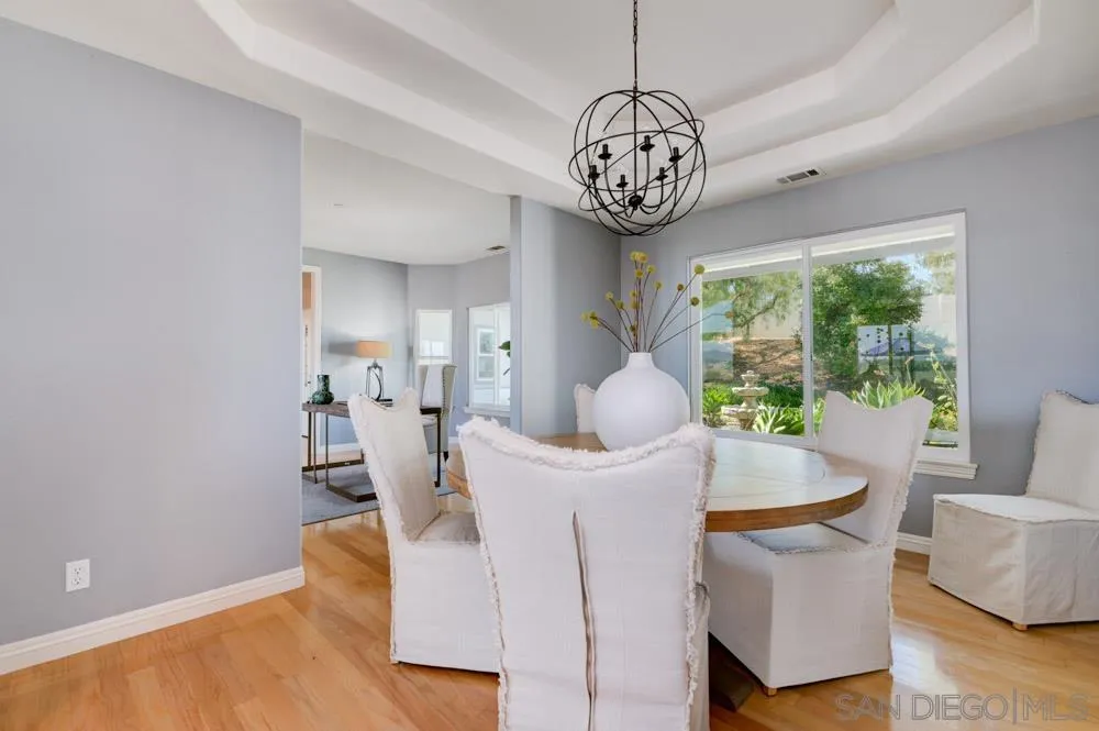 1834 Winterwarm Drive Fallbrook, CA 92028 - Photo 17 of 49 a view of a dining room with furniture window and outside view