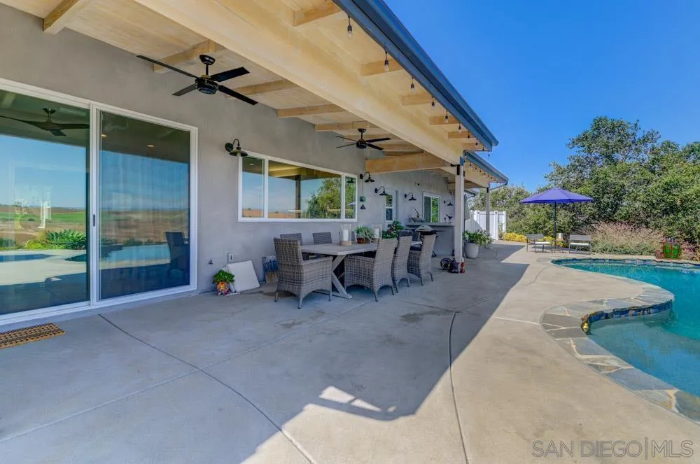 1834 Winterwarm Drive Fallbrook, CA 92028 - Photo 18 of 49 a view of a patio with table and chairs