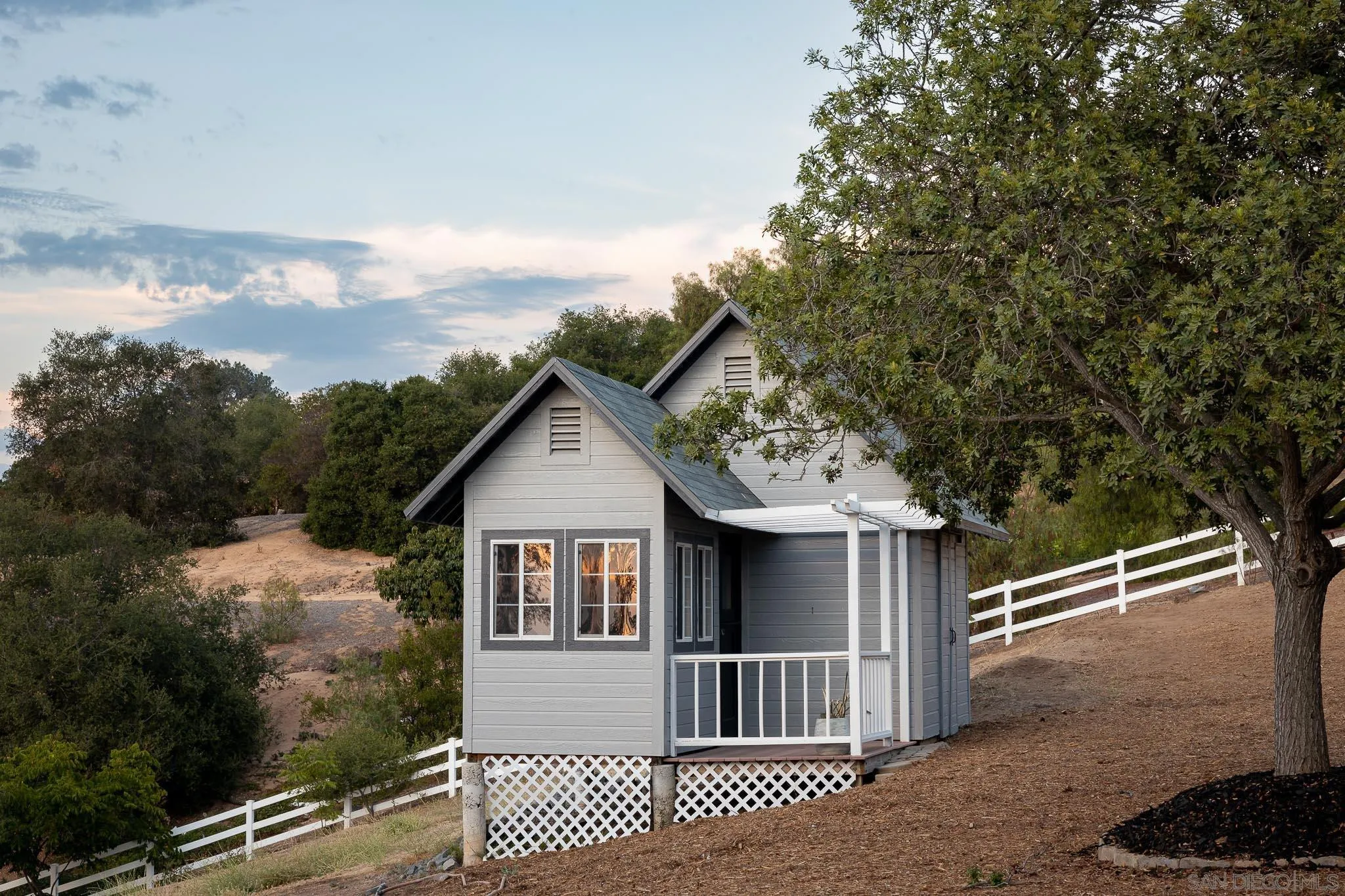 1834 Winterwarm Drive Fallbrook, CA 92028 - Photo 27 of 49 a front view of a house with garage