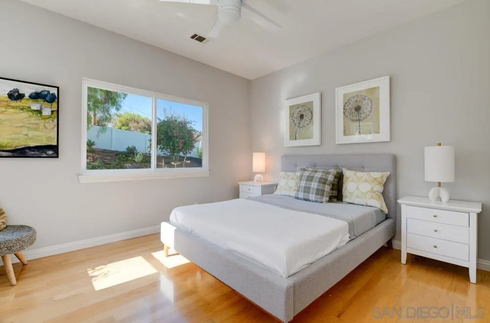 1834 Winterwarm Drive Fallbrook, CA 92028 - Photo 40 of 49 a bedroom with a bed and window