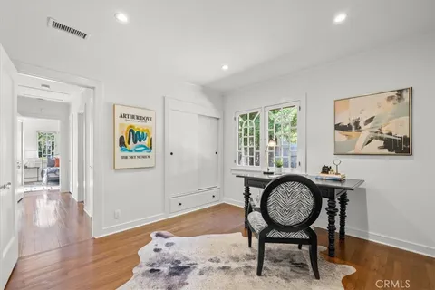 a view of a livingroom with furniture and window