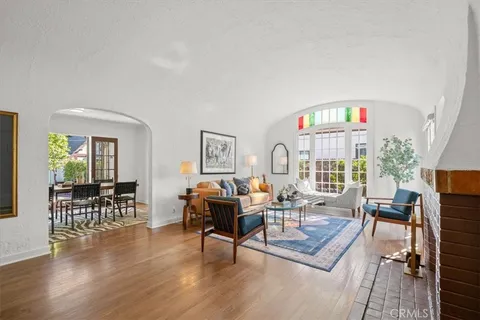 a living room with furniture and a table