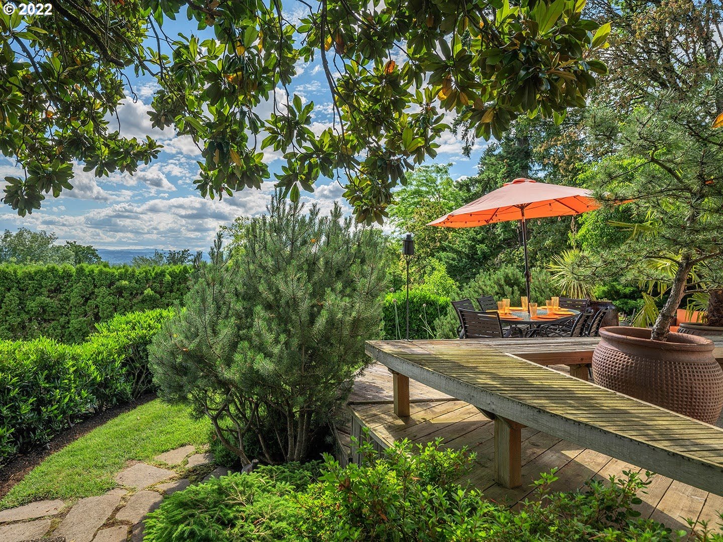 3527 Southwest Dosch Road Portland, OR 97221 - Photo 3 of 32 an outdoor sitting area with chairs