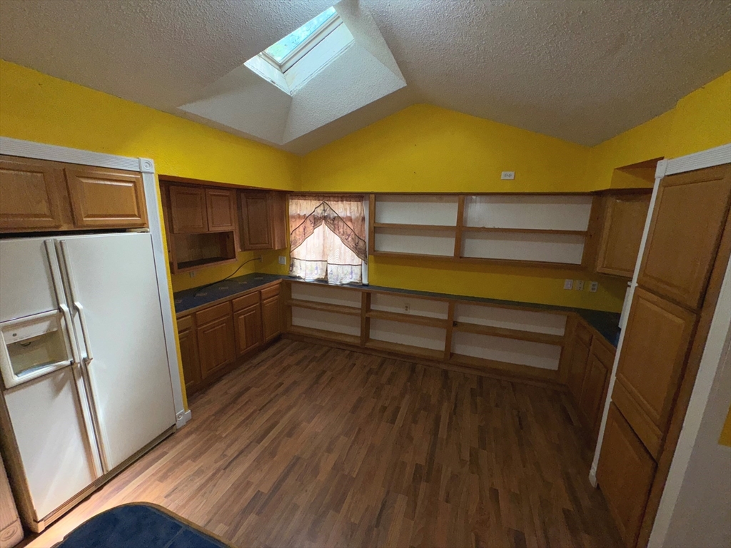 37 David Street Springfield, MA 01104 - Photo 11 of 29 a view of a hardwood floor in a kitchen