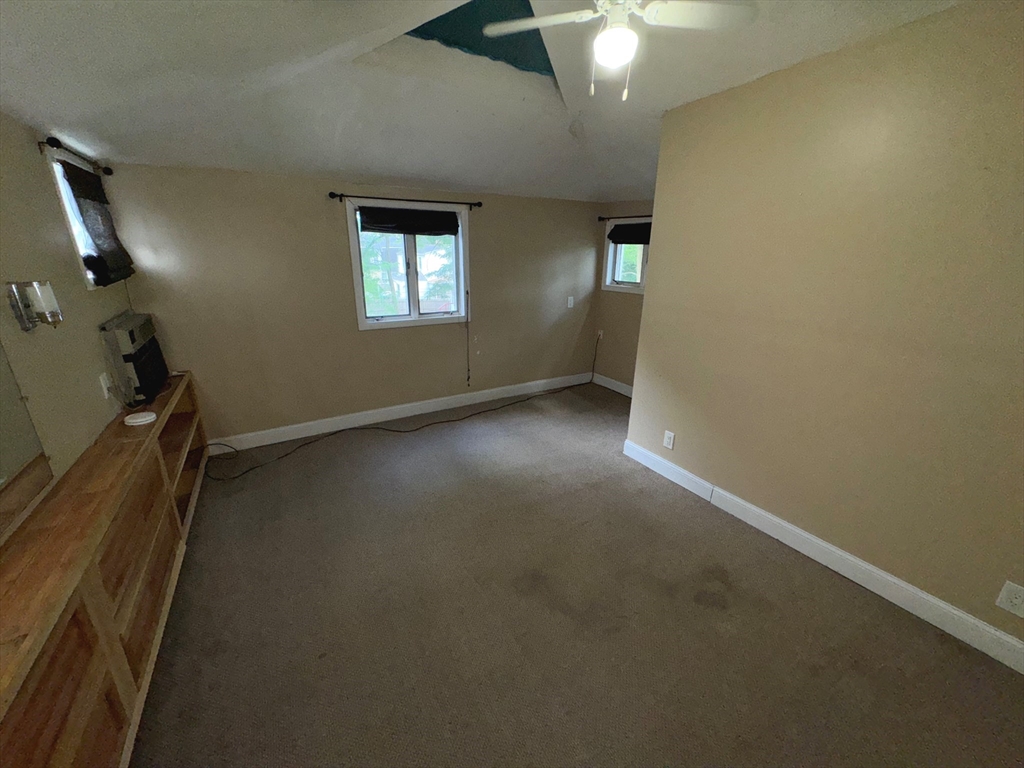 37 David Street Springfield, MA 01104 - Photo 21 of 29 an empty room with a empty space and windows
