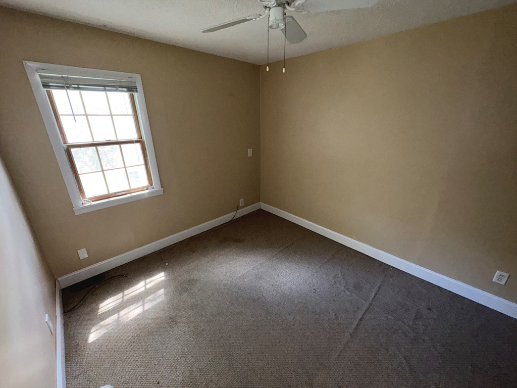 37 David Street Springfield, MA 01104 - Photo 23 of 29 an empty room with a window