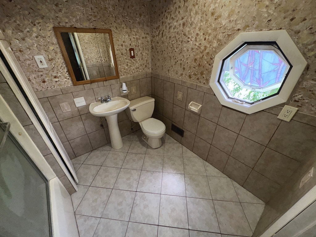 37 David Street Springfield, MA 01104 - Photo 26 of 29 a bathroom with a toilet and a sink