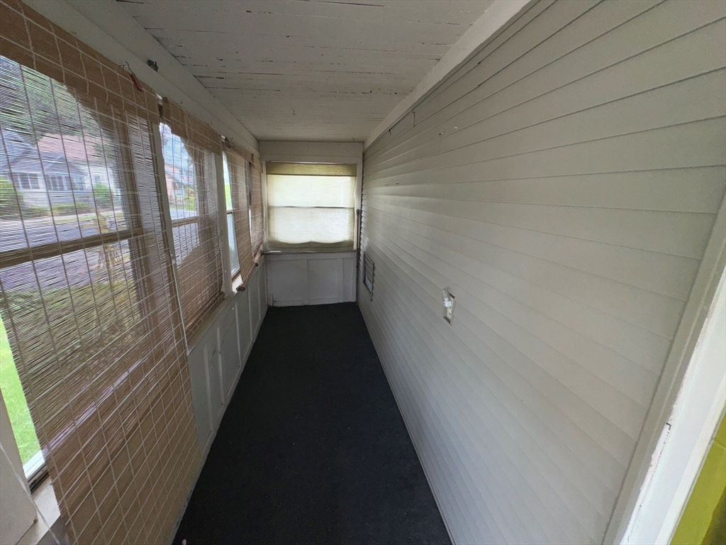 37 David Street Springfield, MA 01104 - Photo 28 of 29 a view of a closet and wooden floor in a room