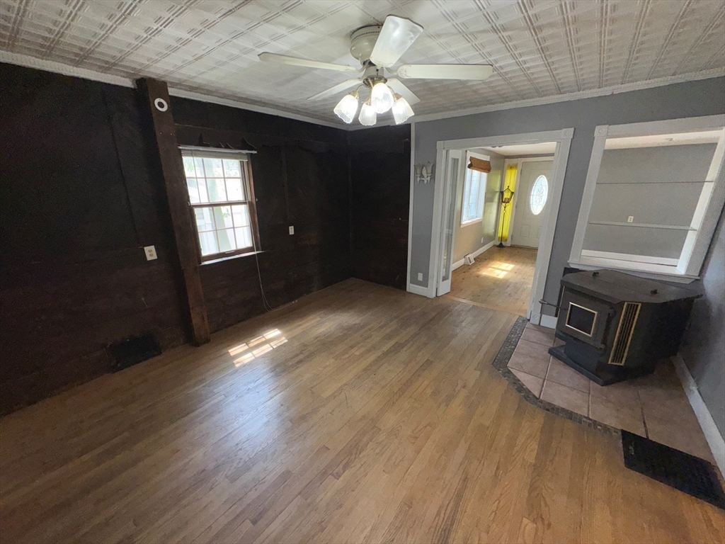 37 David Street Springfield, MA 01104 - Photo 9 of 29 a view of livingroom with hardwood floor and a ceiling fan