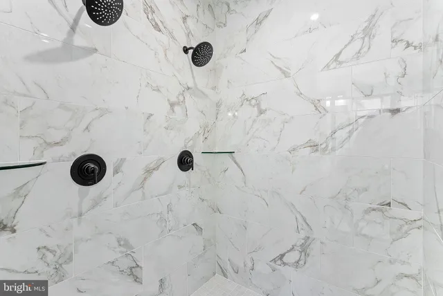 a view of a room with racks on the wall