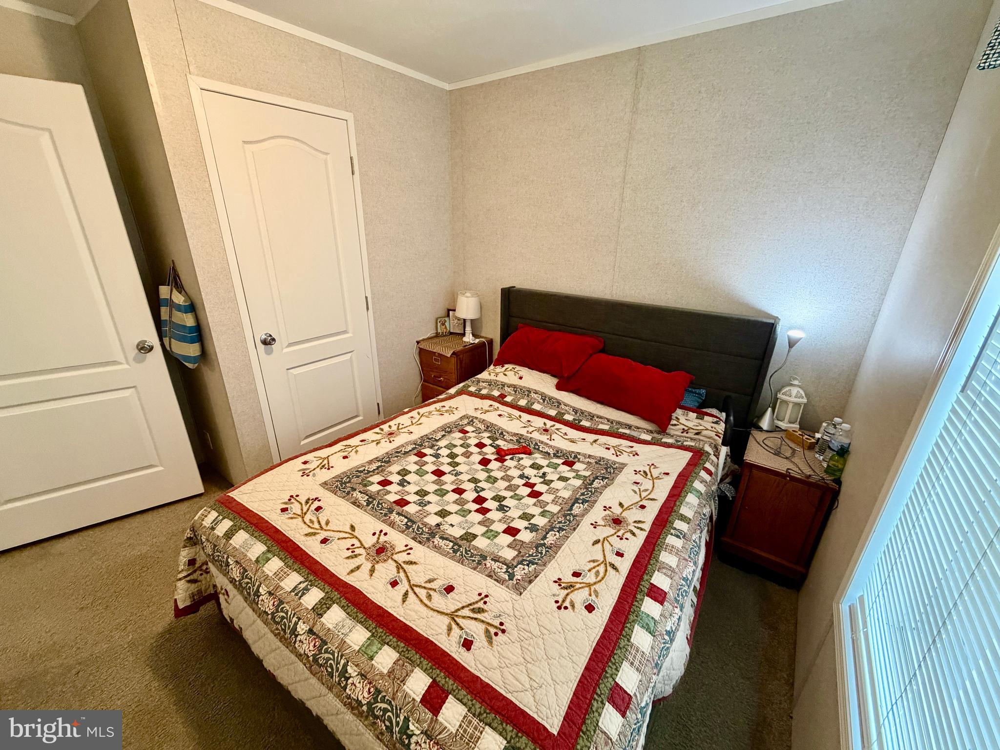 92 Ridgewood Manor Manheim, PA 17545 - Photo 19 of 22 a bedroom with a bed and a mirror