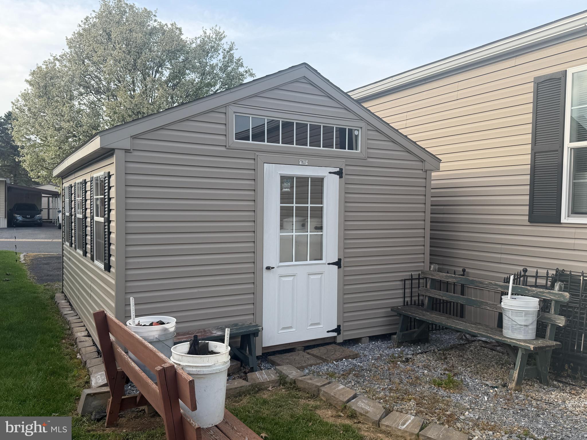 92 Ridgewood Manor Manheim, PA 17545 - Photo 4 of 22 a backyard of a house with outdoor seating