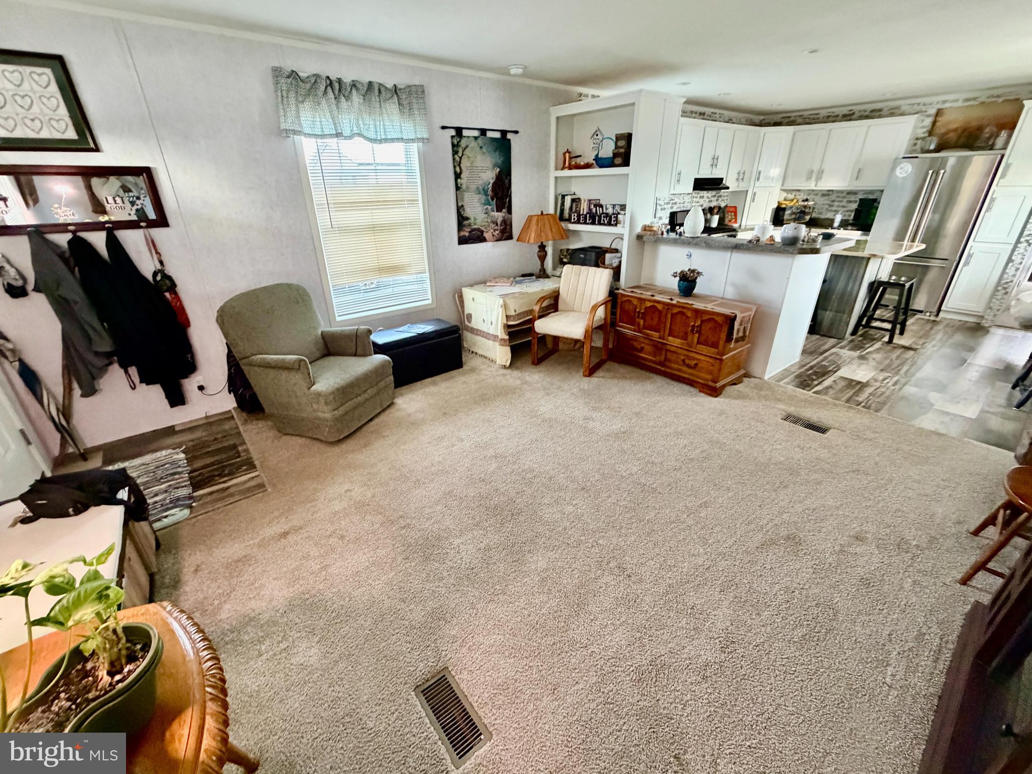 92 Ridgewood Manor Manheim, PA 17545 - Photo 8 of 22 a living room with furniture and a flat screen tv