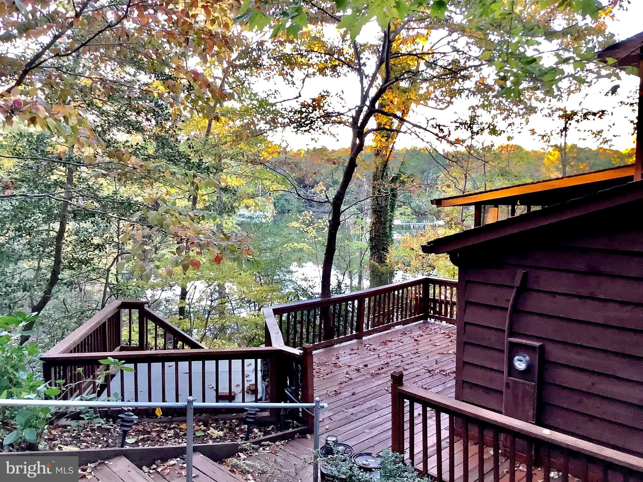 535 Swaggers Point Road Solomons, MD 20688 - Photo 3 of 48 Deck, hot tub, and relaxing water views -!
