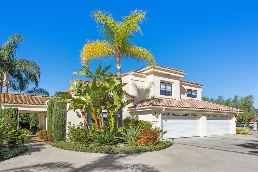 3570 Rosa Way Fallbrook, CA 92028 - Photo 1 of 1 a view of a house with a flower garden