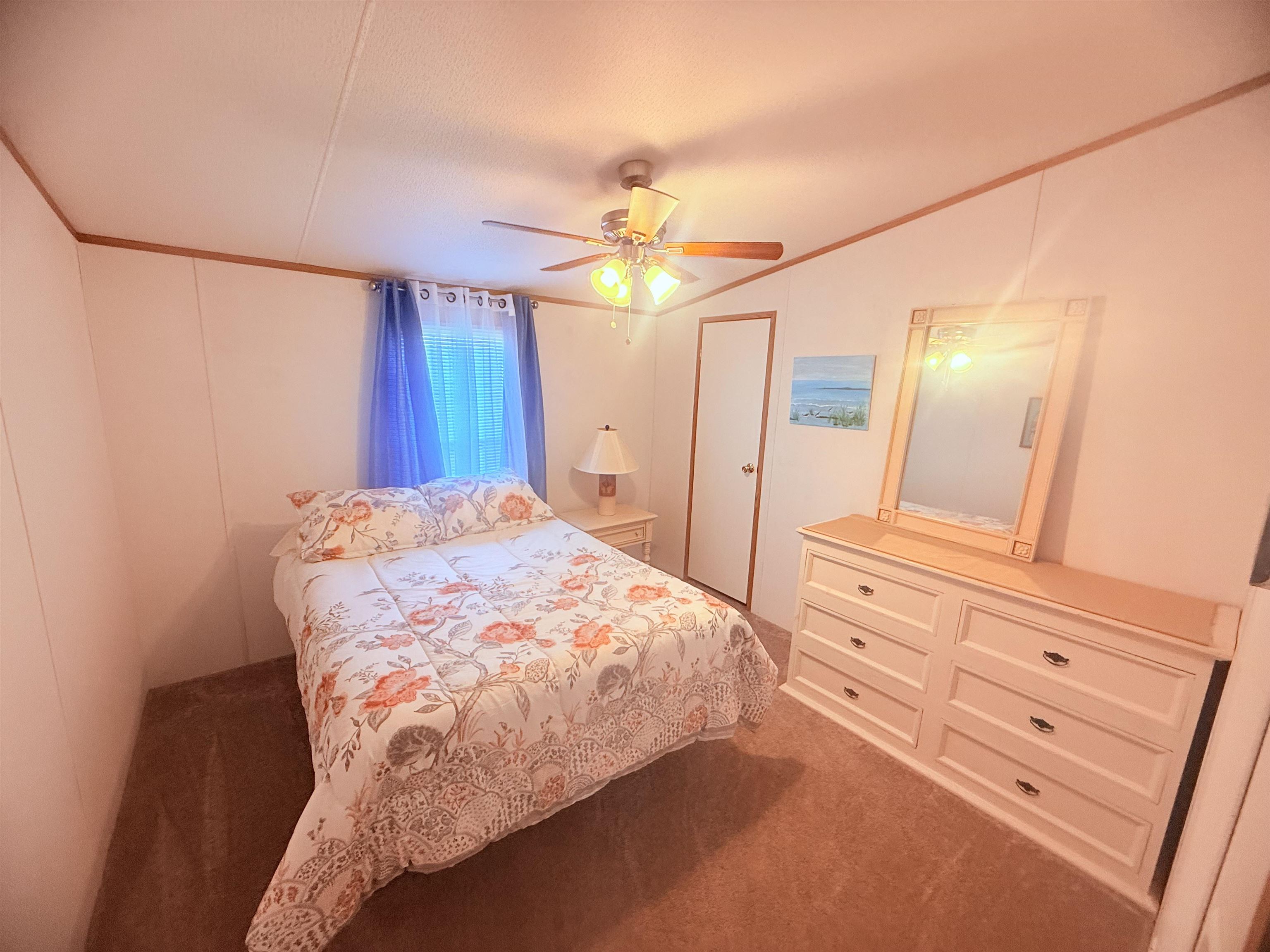 5 Buccaneer Street Murrells Inlet, SC 29576 - Photo 20 of 30 Bedroom with carpet floors, ornamental molding, and a ceiling fan