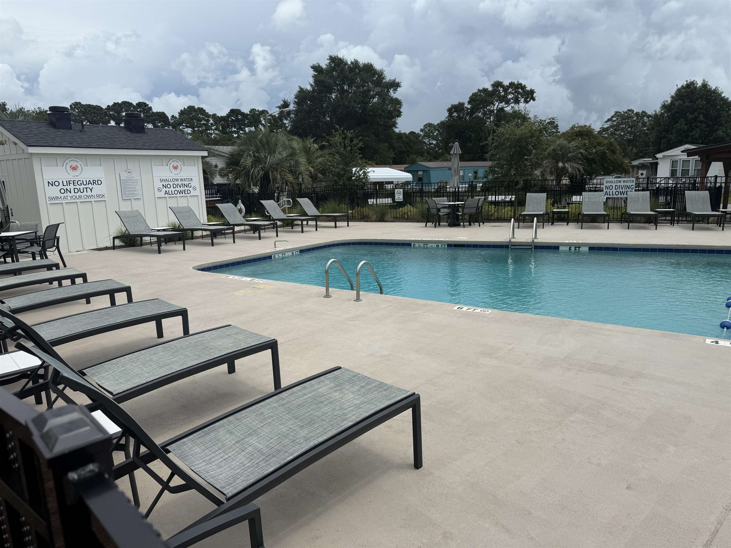 5 Buccaneer Street Murrells Inlet, SC 29576 - Photo 27 of 30 Community pool with a patio