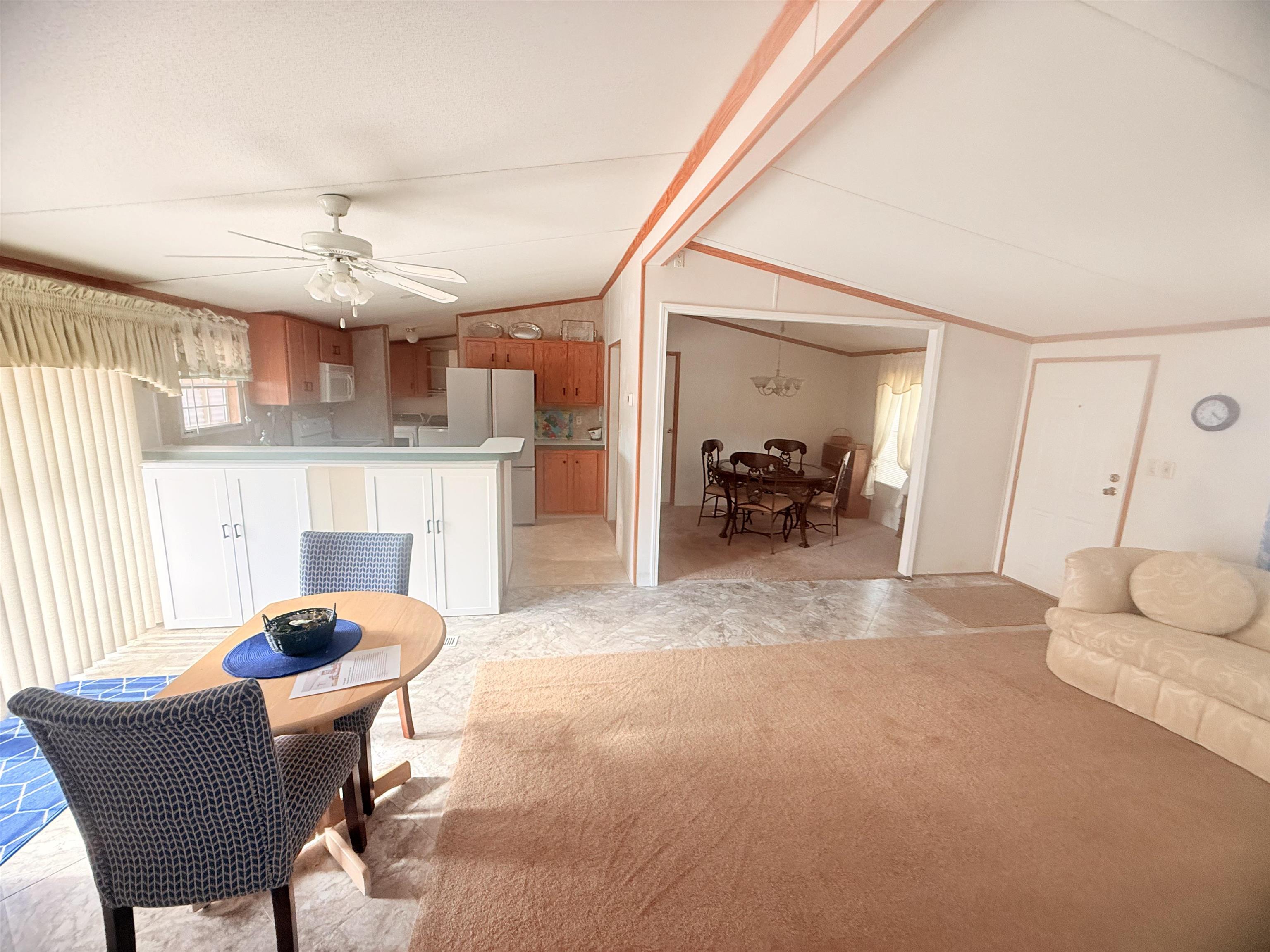 5 Buccaneer Street Murrells Inlet, SC 29576 - Photo 8 of 30 Living area with ceiling fan and crown molding