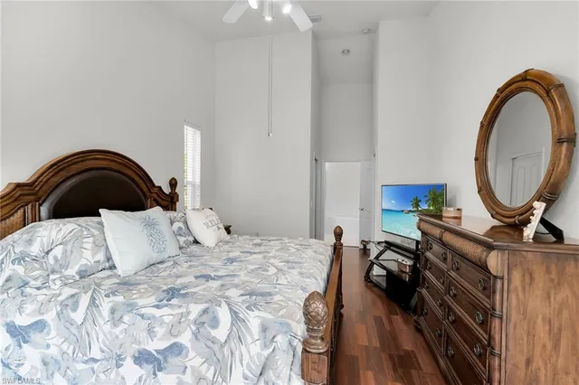 a bathroom with a bathtub sink and mirror