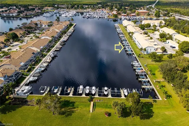 an aerial view of house with yard
