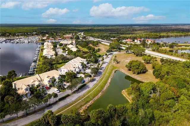 an aerial view of ocean residential houses with outdoor space