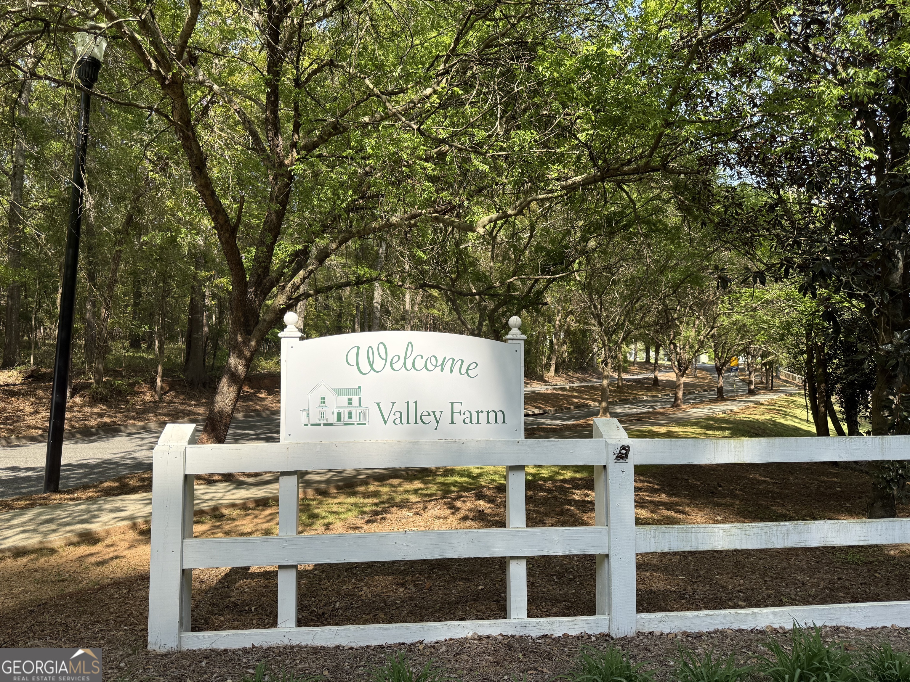 a sign on the side of a road