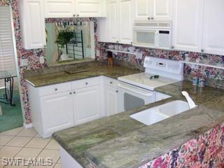 7465 Jacaranda Park Road, Unit 203 Naples, FL 34109 - Photo 2 of 8 Gallery Image 2
