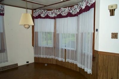 Lesh Road Sciota, PA 18354 - Photo 4 of 7 a view of a bathroom with a shower and a tub