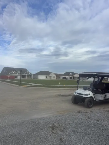 a lobby with granite countertop furniture a fireplace and a window
