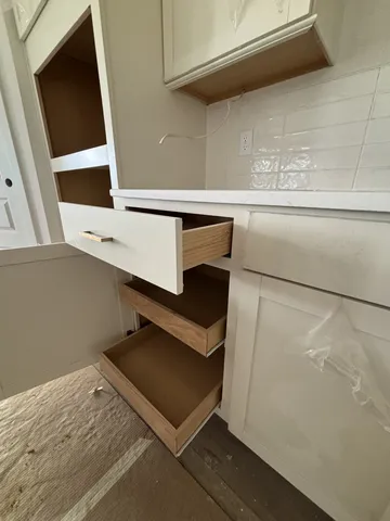 an aerial view of a house with a garden