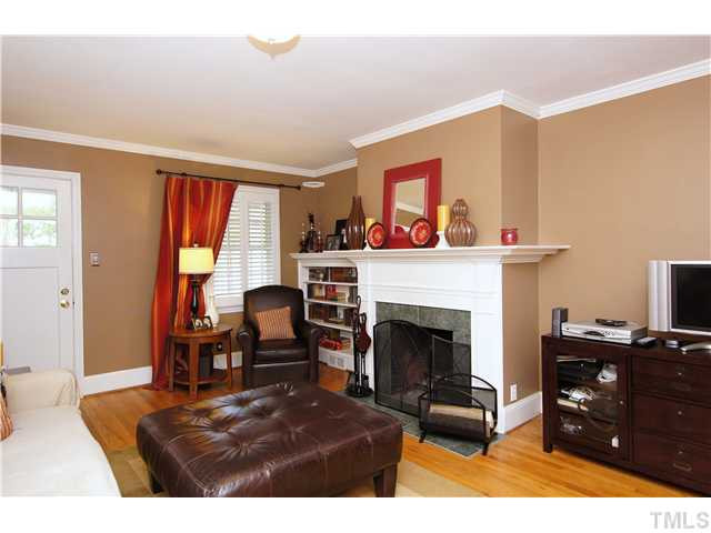 1301 Brooks Avenue Raleigh, NC 27607 - Photo 4 of 25 Beautiful fireplace to keep you cozy and warm! Living Room