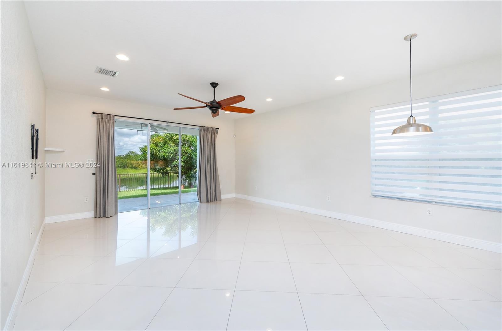 4136 Southwest 179th Way Miramar, FL 33029 - Photo 14 of 42 a view of an empty room with a window