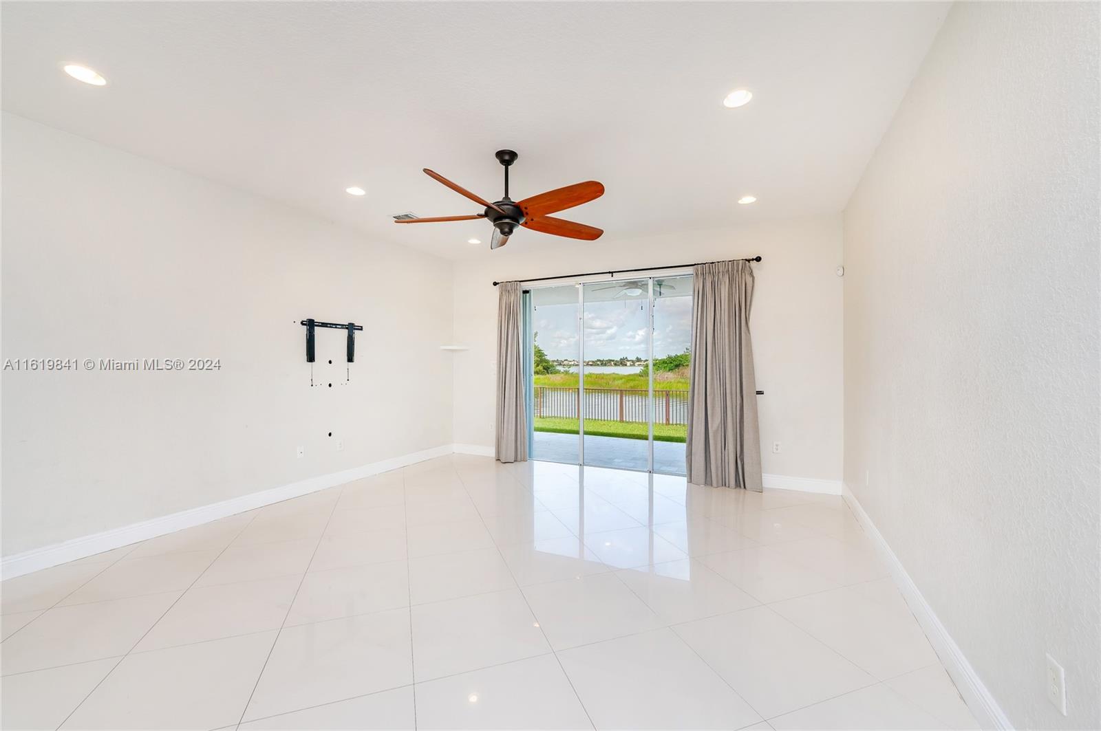 4136 Southwest 179th Way Miramar, FL 33029 - Photo 15 of 42 a view of an empty room with a window
