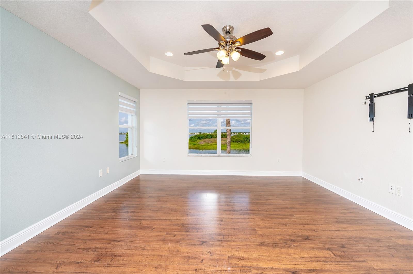 4136 Southwest 179th Way Miramar, FL 33029 - Photo 22 of 42 wooden floor in an empty room with a window