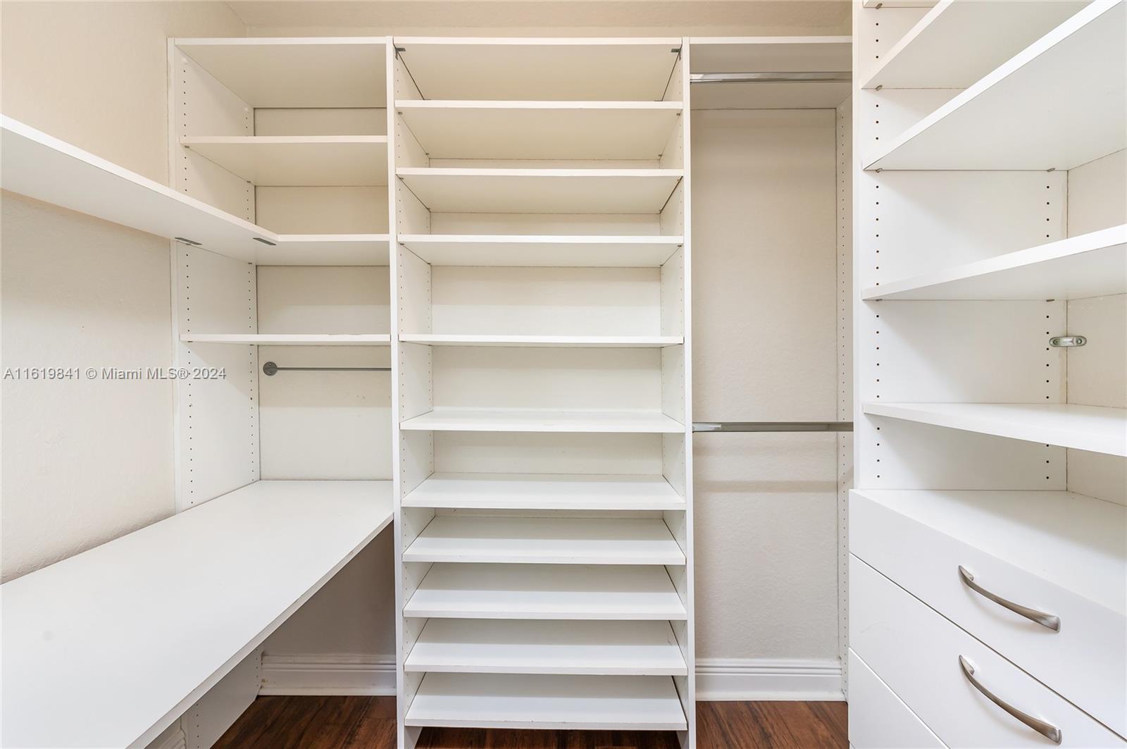 4136 Southwest 179th Way Miramar, FL 33029 - Photo 23 of 42 a view of walk in closet with empty racks