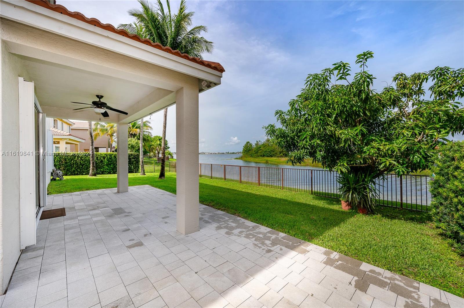 4136 Southwest 179th Way Miramar, FL 33029 - Photo 35 of 42 a view of a house with a yard and potted plants