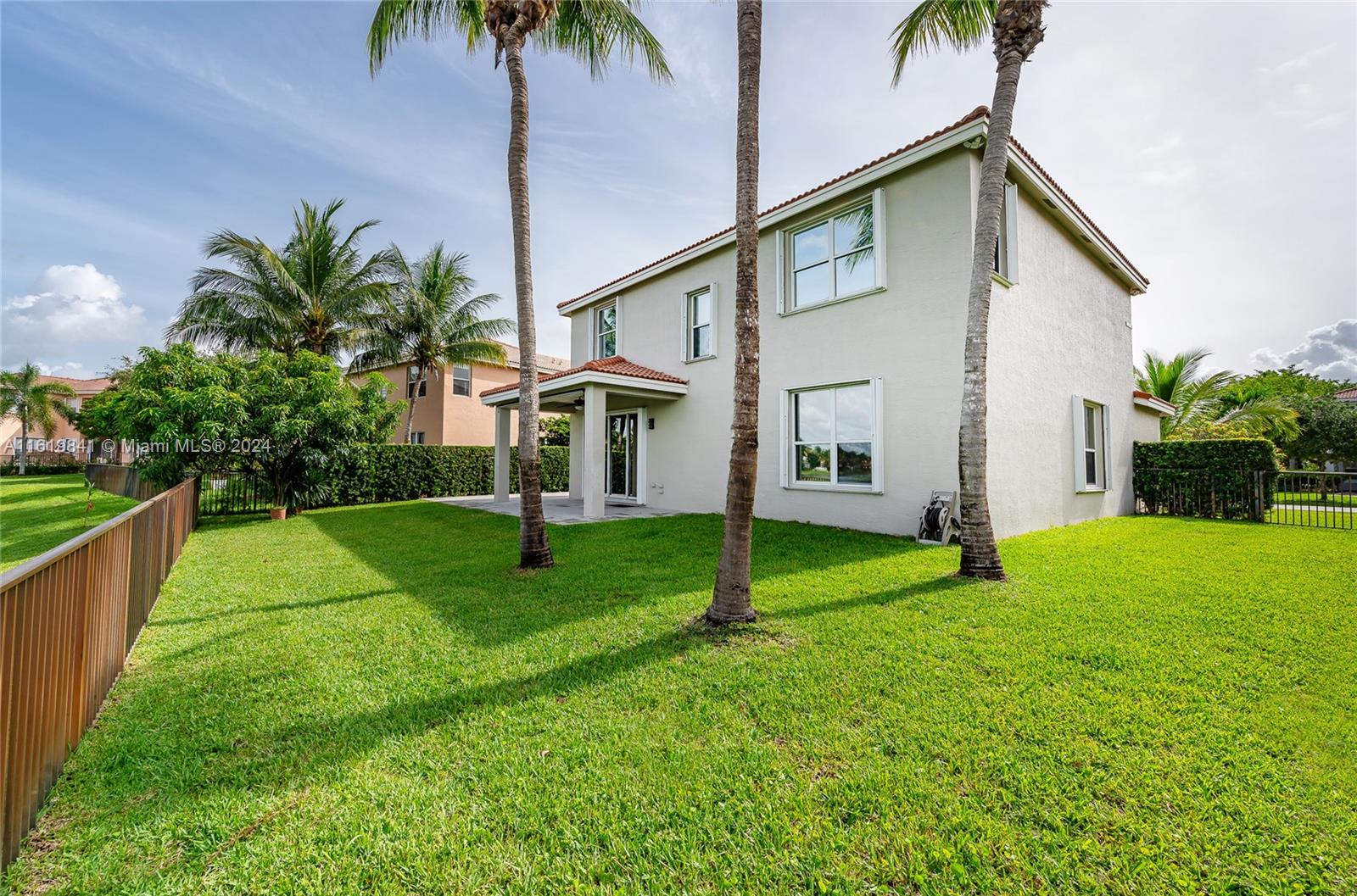 4136 Southwest 179th Way Miramar, FL 33029 - Photo 37 of 42 a view of an house with backyard space and garden