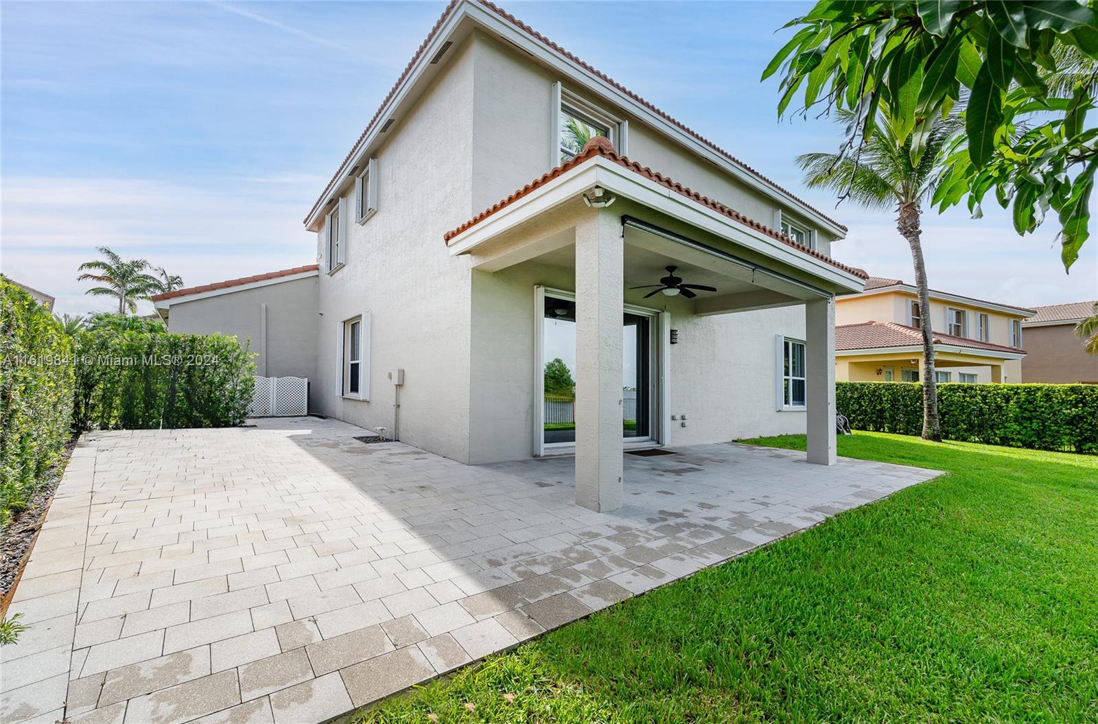 4136 Southwest 179th Way Miramar, FL 33029 - Photo 5 of 42 a view of a house with a yard and potted plants