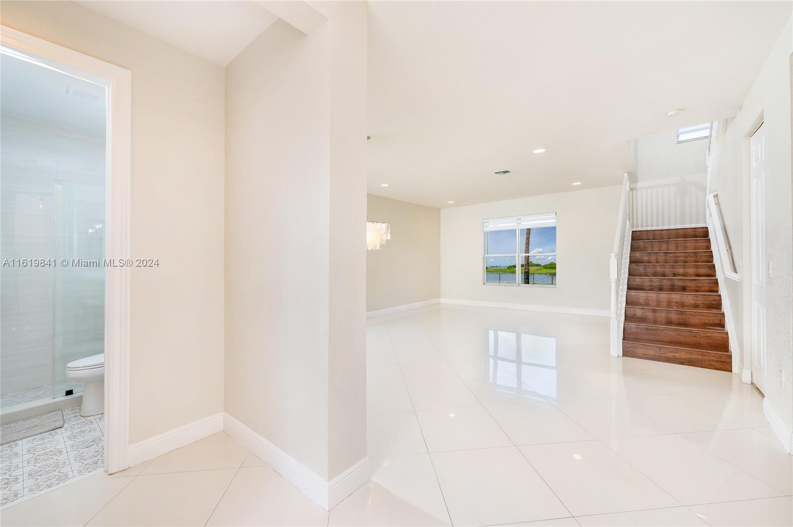 4136 Southwest 179th Way Miramar, FL 33029 - Photo 6 of 42 a view of entryway with wooden floor